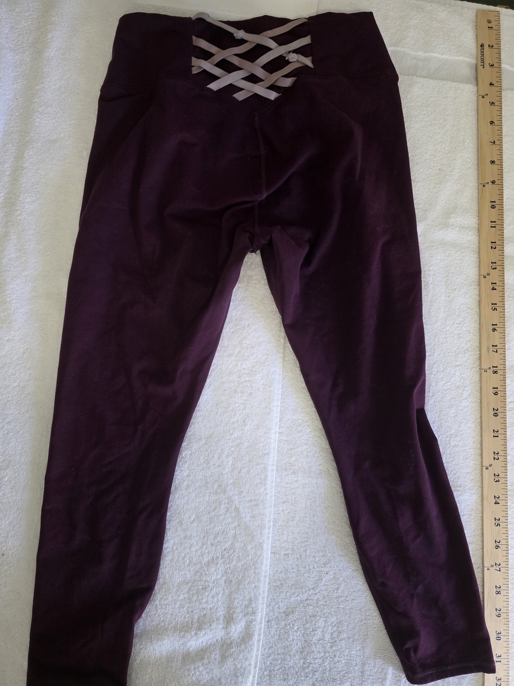 Burgundy leggings with criss-cross ribbon detail